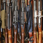 Automatic weapon collection, rifles and machine guns in gun cabi